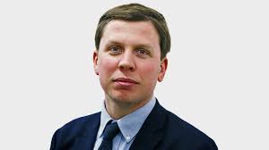 Sainsbury's chief sticks to his guns despite £261m loss