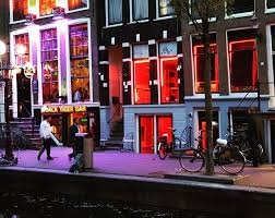 The Oudezijds Achterburgwal Canal Of The Red Light District Of Amsterdam In The Evening Voyage Decouverte