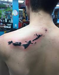 27 Minimalist Peter Pan Tattoos To Remind You To Never Grow Up Peter Pan Tattoo Peter Pan Tattoos