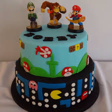 50 mario birthday cakes ranked in order of popularity and relevancy. Retro Pacman Mario And Donkey Kong Cake Made By Katy Arnold Boy Birthday Cake Video Game Cakes Birthday Party Cake