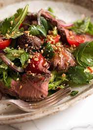 Add a sprinkle of sesame seeds and more fresh herbs, then serve and enjoy. Thai Beef Salad Recipetin Eats