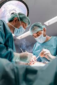 Team Of Surgeons Operating In The Hospital Stocksy United Hospital Photography Medical Awareness Doctor Of Nursing Practice