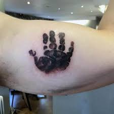 The design is very simple and mostly, the name of the child or their birth date or both is inked. 60 Handprint Tattoo Designs For Men Impression Ink Ideas