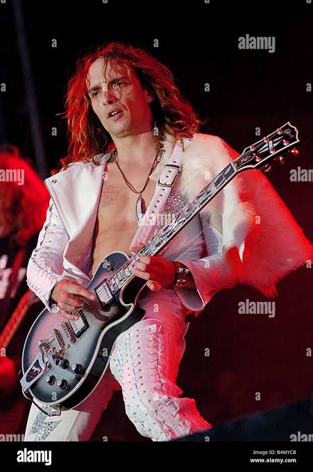 Justin Hawkins lead singer of The Darkness main stage at T in the Park  Stock Photo - Alamy
