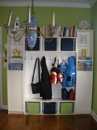 In order to do this, he had to add holes on the outside of the 2 bookcase panels that would be in the middle of the mudroom lockers. Ikea Hack Entryway Mudroom Organizer That Was Made From Billy Bookcases From Ikea 4 Total 2 Of Each Type Added The Half Ikea Storage Ikea Wall Storage