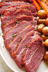 This Easy Crock Pot Corned Beef Is Cooked In Guinness Beer For A Crispy Juicy And Flavorful Meal Crock Pot Corned Beef Cooking Corned Beef Corned Beef Recipes