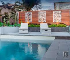 The Lucario Outdoor Screen Design Is Inspired From The Designers Travels To Morocco This Attention Grabbing Outdoor Wall Art Outdoor Screen Poolside Planters