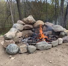 Our circular fire pit is about 2' tall x 5' total diameter and a 3' interior diameter. Rock Boulder Fire Pit Outdoor Fire Pit Area Fire Pit Natural Stone Natural Fire Pit