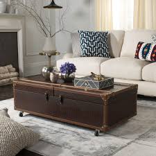 These trunk coffee tables not only boost the style factor in your space—they also serve as storage for everything from reading material to throw blankets. Coffee Table With Wine Storage Off 74