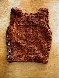 Free Pattern Pebble Henry S Cobblestone Inspired Manly Baby Vest The Thrifty Knitter
