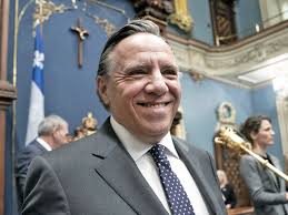 Quebec's CAQ government introduces bill banning religious symbols for  public workers
