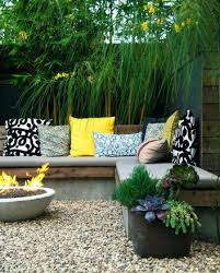 If you are looking into designing and building your own garden patio, you'll need some ideas. There Are Several Kinds Of Flowering Plants Tall Leafy Plants Birdfeeders Wind Chimes Small Patio Design Small Backyard Gardens Backyard Landscaping Designs