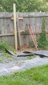 Set A New Post Because The Other One Is Broken And The Fence Is Leaning Toward The Neighbor S Yard Quite A Bit Fence Post Repair Garden Inspiration Fence