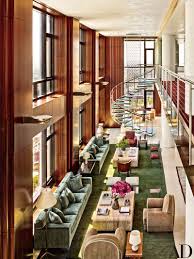 Macassar Ebony Panels The Living Room Of A Chicago Apartment Renovated By The Archi Interior Design Studio Affordable Interior Design Top Interior Design Firms
