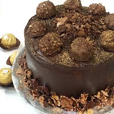 When getting ready to serve, remove cake about 1 hour before serving to allow buttercream to soften. Ferrero Rocher Fudge Cake Sherbakes