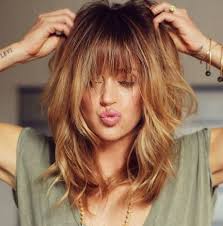 The top hair uniquely chopped with an asymmetrical shoulder length haircut is an extraordinary and an alluring hairstyle for girls who are looking for a medium length hairstyle with an edgy haircut. Edgy Haircuts For Medium Length Hair