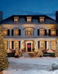 How To Decorate Your Home For The Holidays With Evergreen Wreaths Outdoor Christmas Christmas Lights Christmas House