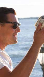 The great collection of wolf of wall street wallpaper for desktop, laptop and mobiles. The Wolf Of Wall Street With Money In Hand Wallpaper Id 4665