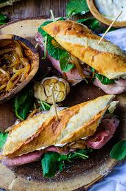 Potatoes roast with onions, garlic and fresh thyme before tossing with leftover prime rib and spinach. Leftover Prime Rib Sandwich Recipe Food Above Gold