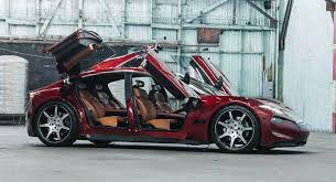 All of the doors on the tesla model x are motorized. Fisker Sees Tesla S Two Falcon Wing Doors Raises It Four Butterfly Doors