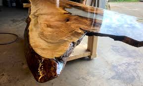 Lovely unique table made from 2 slabs of solid tree trunk. This Ontario Company Is Taking Live Edge Furniture To The Next Level Luxury Residence
