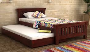 Bunk beds with trundle beds. Bring Trundle Bed Online Wooden Street And Enjoy Extra Sleeping Space With These Twin Trundle Beds Choose From Cool Range Trundle Bed Bed Wooden Trundle Bed