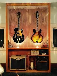 Purchase an ikea havsta glass door cabinet, 31 7/8 x 13 3/4 x 48 3/8″ (item # 104.151.98), which is tall enough to contain a standard guitar and has glass doors for admiring your investment. 20 Best Guitar Storage Cabinet Ideas Guitar Storage Guitar Storage Cabinet Guitar Room