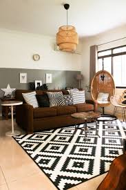 Pin By Ilse Elizabeth Deysel On Living Room In 2020 Black Carpet Living Room White Carpet Living Room White Family Rooms