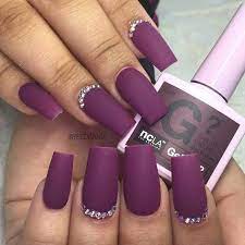 Add gemstones and a perfect almond shape for a touch of the majestic. 43 Nail Ideas To Inspire Your Next Mani Stayglam Matte Purple Nails Purple Nail Designs Rhinestone Nails