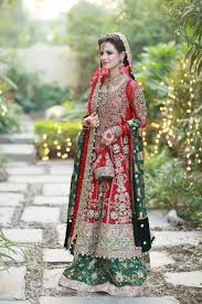 This fashion color combo can work, and not in this series, we feature unique and unexpected color combinations, then give you stylish outfit ideas so complement the green color of the dress with a gorgeous red lip, then paint your nails a dark, vampy. Red And Green Bridal Lehenga Novocom Top
