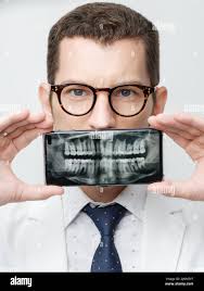 Doctor looking teeth x ray