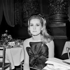 The eighteen year old french film actress catherine deneuve. Great Outfits In Fashion History Catherine Deneuve In Double Decker Bows Fashionista
