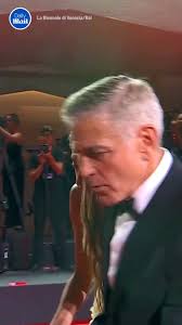 George Clooney rushes to help as photographer