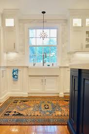 It features a minimalist kitchen island with chairs that adds a touch of warmth and a modern feel. 15 Blue Kitchen Islands Their Paint Colors Chrissy Marie Blog