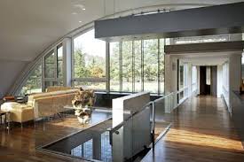 The architect then decided to bury part of the building. Listing Of The Week Arc House Stands Out In Hamptons