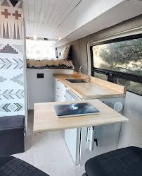 Reposting Vanlife 01 Swivel Seats Combined With A Lagun Swivel Table Make For A Useful Work Nook In The Front Of Van Y Van Life Diy Van Living Van Life