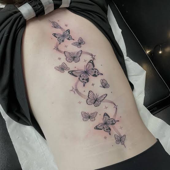 Enchanting Sparkling Butterflies Spine Tattoo for Female
