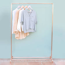 Black And Gold Clothes Rail Pin On The Shop