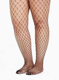 Fishnet stockings have been dated back as far as the 1900s but no one is entirely sure how although fishnet stockings have been through many different phases in their ever growing popularity. Plus Size Black Fishnet Tights Torrid