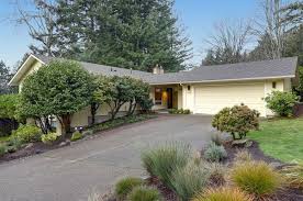 I have seen a dark teal like blue on brick and actually landscaped a brick rancher with the blue teal shutters and the color looks great. Ready To Remodel A Ranch House Here Are 6 Standout Remakes For Sale Oregonlive Com