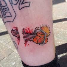 Men are very creative when it comes to the moment to choose the part of the body they would like to put tattoos on. Small Chainsaw Shin Tattoo Best Tattoo Ideas Gallery
