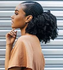 A tapered afro's inches are shaped into a sort of boxy shape while the sides are super short. Rock Your Graduation In Style With These Best Graduation Hairstyles