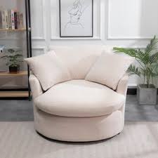Feathery fabric falls over the sides of this chair that features a rounded base, turning it into a cozy. Oversized Round Cuddle Chair Wayfair