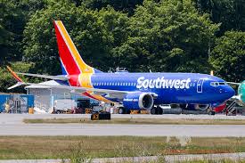 Cost per device for wifi access is $8, unlimited tv and movies and access is free. Southwest Airlines N7203u Painted