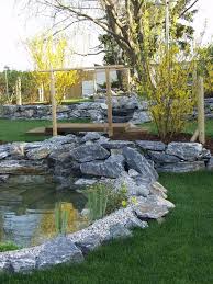 Natursteinmauer Heuriger Pfaffstatten Gartengestaltung Reinisch Gmbh Natursteinmauer Landschaftsbau Ideen Garten