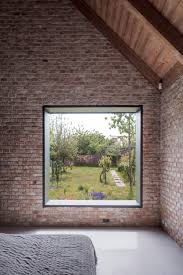 Martin Skocek Contrasts Modern Facade Of House V With Brick Interiors In 2020 Brick Interior Facade Brick