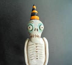 How To Make A Skeleton Model Out Of Clay Halloween Skeleton With Pumpkin Bucket Made From Polymer Clay On Polka Dot Base With Images Halloween Skeletons Halloween Pumpkin Bucket