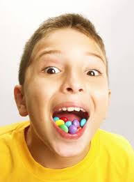 Boy eating candy Stock Photos, Royalty Free Boy eating candy Images