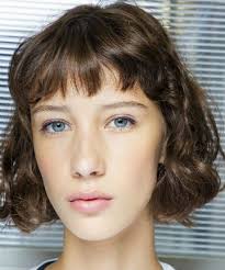 If you're looking to spruce up your hair but aren't interested in going through the long process and maintenance of using dyes and having to deal with a whole host of products, layered haircuts are a versatile hairstyle for any season or occasion. Best Haircuts For Curly Hair Layered Bob 13 Best Haircuts For Curly Hair Page 9