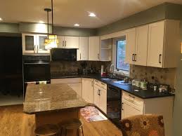What Color Should I Paint My Kitchen Cabinets Textbook Painting Painting Kitchen Cabinets White Brown Kitchen Cabinets White Countertops